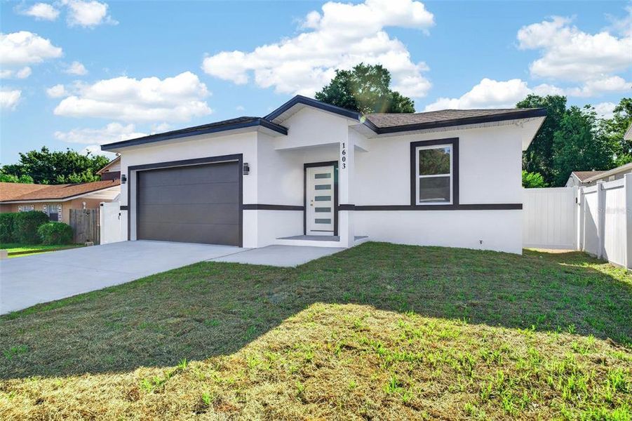 Front exterior of a new home in , Lakeland, FL, highlighting curb appeal (Image 2). Front exterior of a new home in , Lakeland, FL, highlighting curb appeal (Image 2).