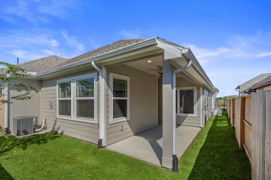 Exterior details and patio area of a home in Meridiana, Iowa Colony (Image 3).