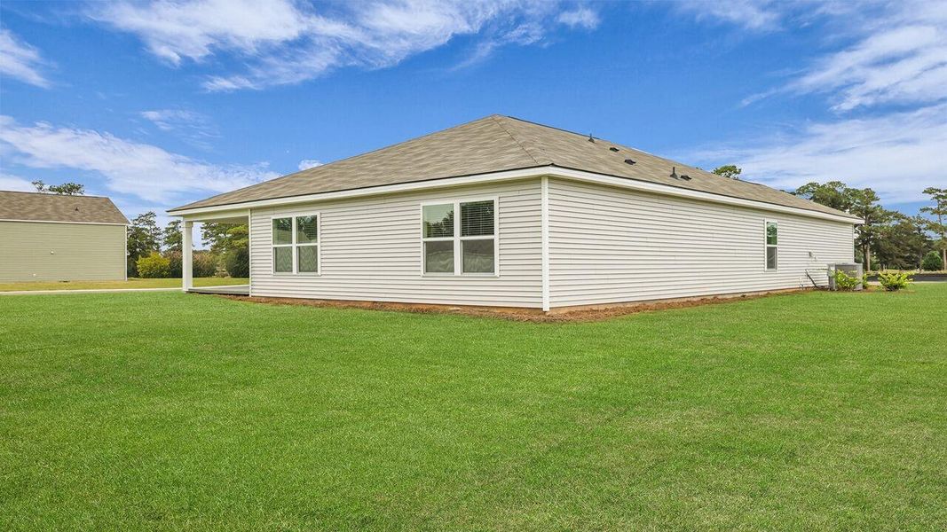 Exterior details and patio area of a home in Huggins Hill, Manning (Image 17).