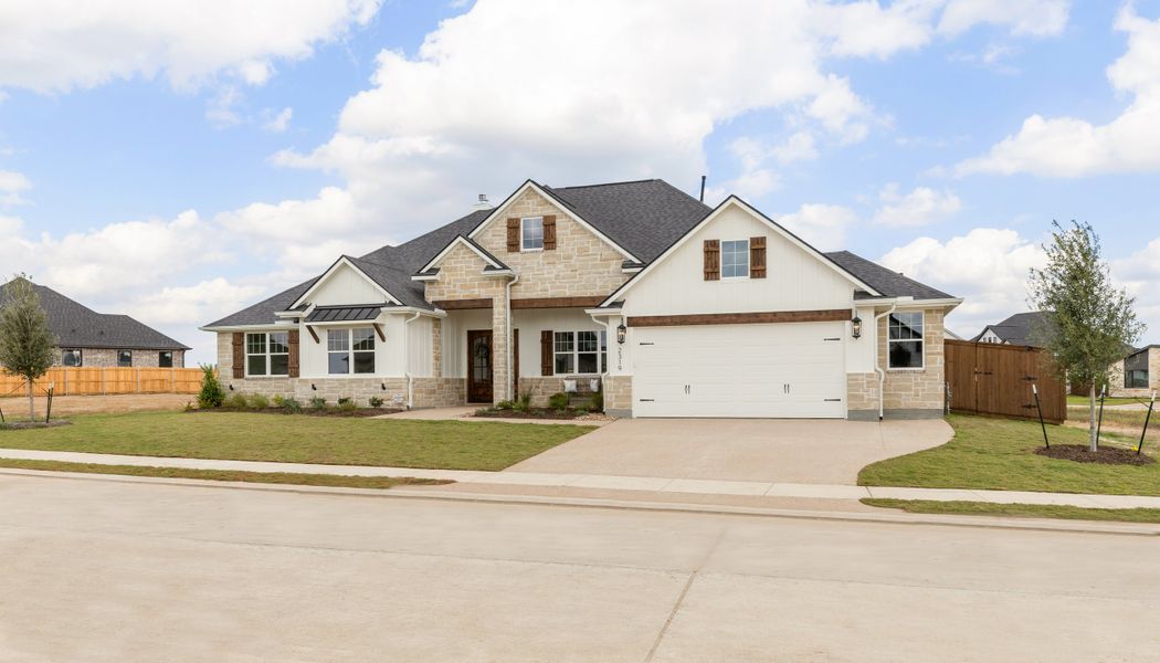 Representative exterior photo of a completed home built from the The Grayson by Reece Homes in Harvest Meadows, Bryan, TX (Image 22). Representative exterior photo of a completed home built from the The Grayson by Reece Homes in Harvest Meadows, Bryan, TX (Image 22).