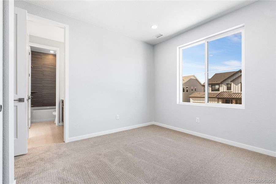 Spacious, unfurnished interior of a new home in Stargaze at Solstice, Littleton (Image 23).