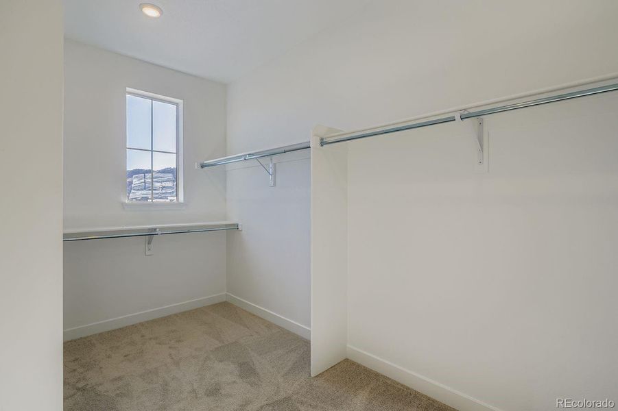 Spacious, unfurnished interior of a new home in Red Rocks Ranch: The Grand Collection, Morrison (Image 12).