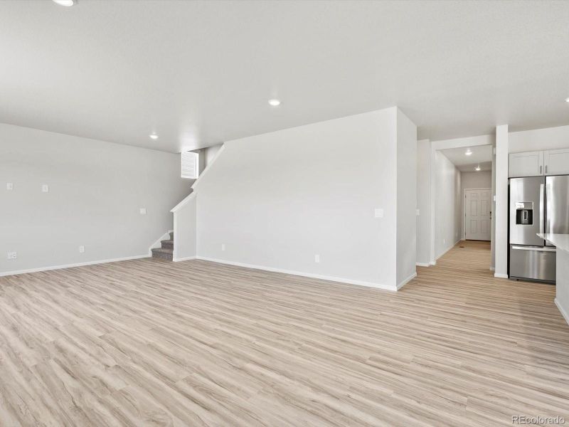 Spacious, unfurnished interior of a new home in Ridgeline Vista: The Canyon Collection, Brighton (Image 20).