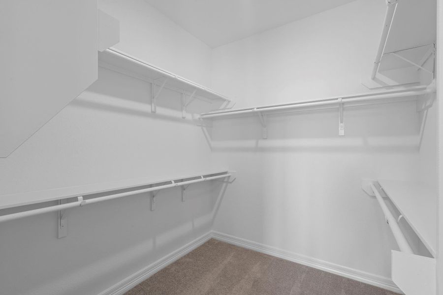 A view of your large primary walk-in Closet A view of your large primary walk-in Closet