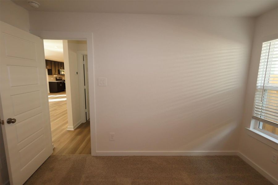 Spacious, unfurnished interior of a new home in Pinewood at Grand Texas, New Caney (Image 25).