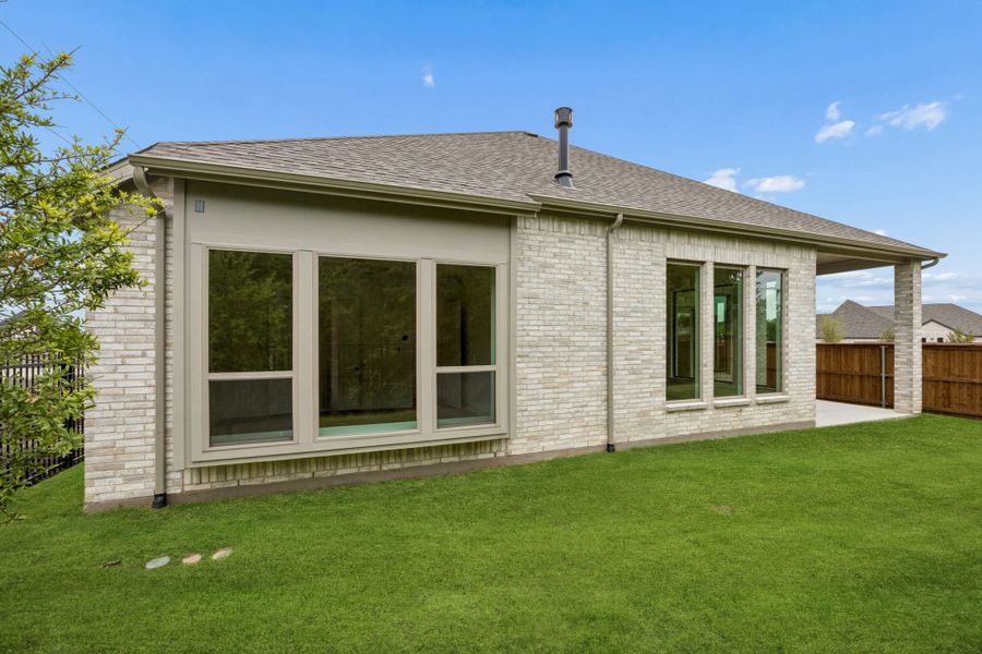 Exterior details and patio area of a home in The Parks at Wilson Creek, Celina (Image 26). Exterior details and patio area of a home in The Parks at Wilson Creek, Celina (Image 26).