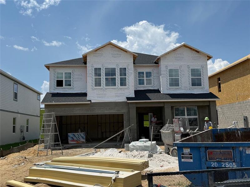 In-progress construction of a new home in Emerson Pointe, Apopka, FL (Image 1). In-progress construction of a new home in Emerson Pointe, Apopka, FL (Image 1).