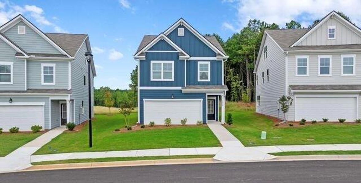 Front exterior of a new home in Walden Park - The Retreat, Jonesboro, GA, highlighting curb appeal (Image 1). Front exterior of a new home in Walden Park - The Retreat, Jonesboro, GA, highlighting curb appeal (Image 1).