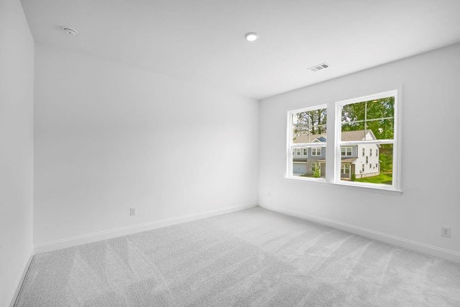 Spacious, unfurnished interior of a new home in Stratford Hills, Ball Ground (Image 15).