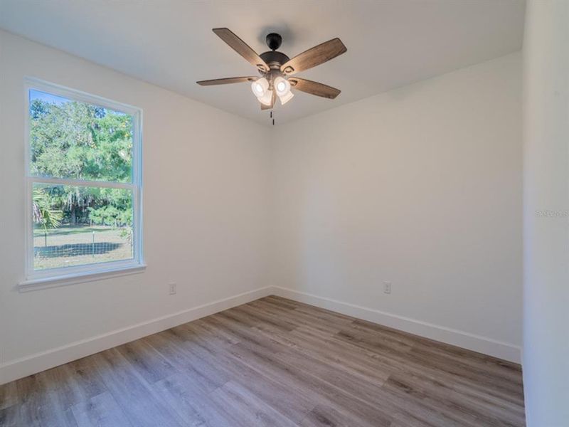 Spacious, unfurnished interior of a new home in , Fort McCoy (Image 27).