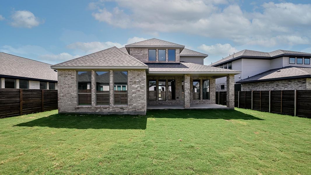 Exterior details and patio area of a home in Juniper Springs, Lockhart (Image 2).
