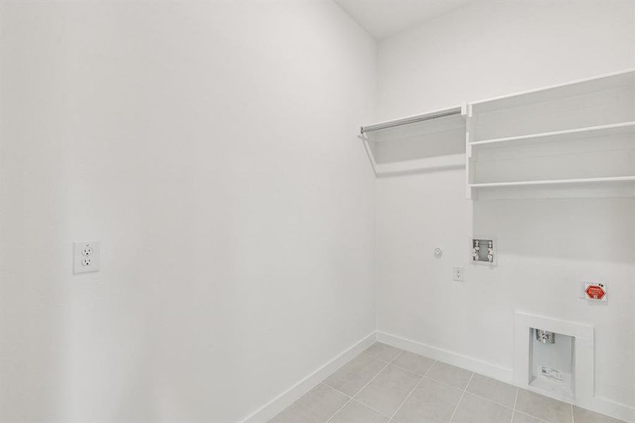 Utility Room in the Da Vinci II home plan by Trophy Signature Homes – REPRESENTATIVE PHOTO