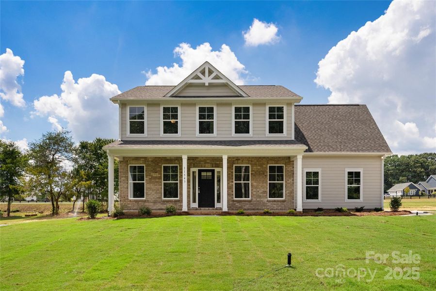 Front exterior of a new home in , Stanfield, NC, highlighting curb appeal (Image 21).