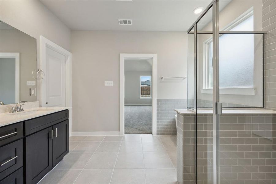 Looking into the bedroom from the back of the ensuite bathroom