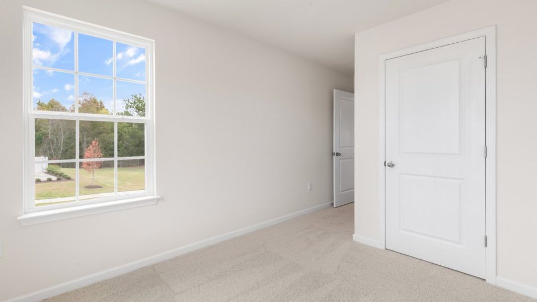 Spacious, unfurnished interior of a new home in Brightwood Farm, Whitsett (Image 19).