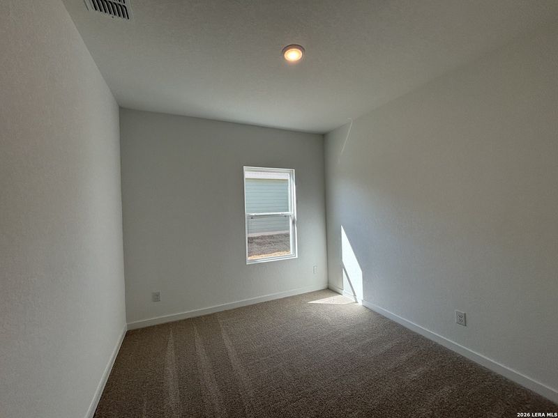 Spacious, unfurnished interior of a new home in The Summit at Saddlebrook Ranch 55's, Schertz (Image 24).