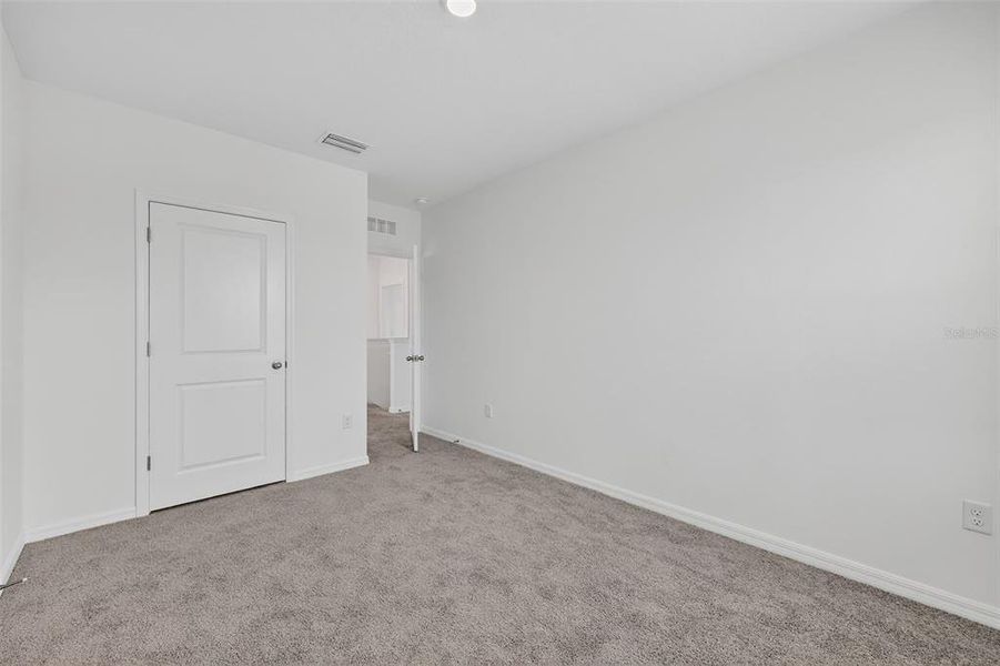 Spacious, unfurnished interior of a new home in Farm at Varrea, Plant City (Image 27).