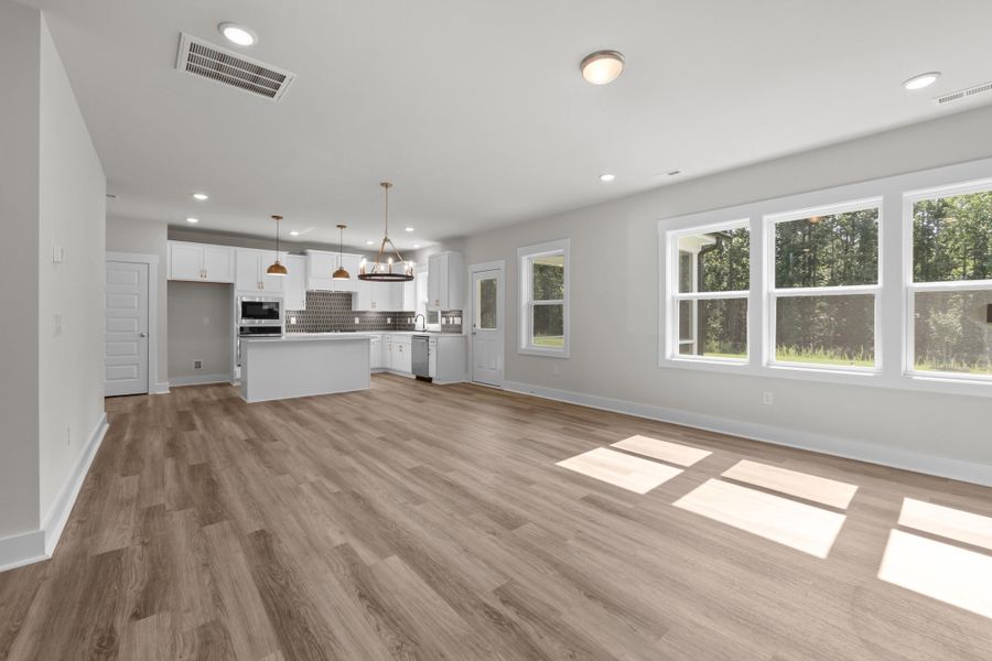 Representative unfurnished interior of a home built from the Happy by Garman Homes in Golden Gate, High Point (Image 14).