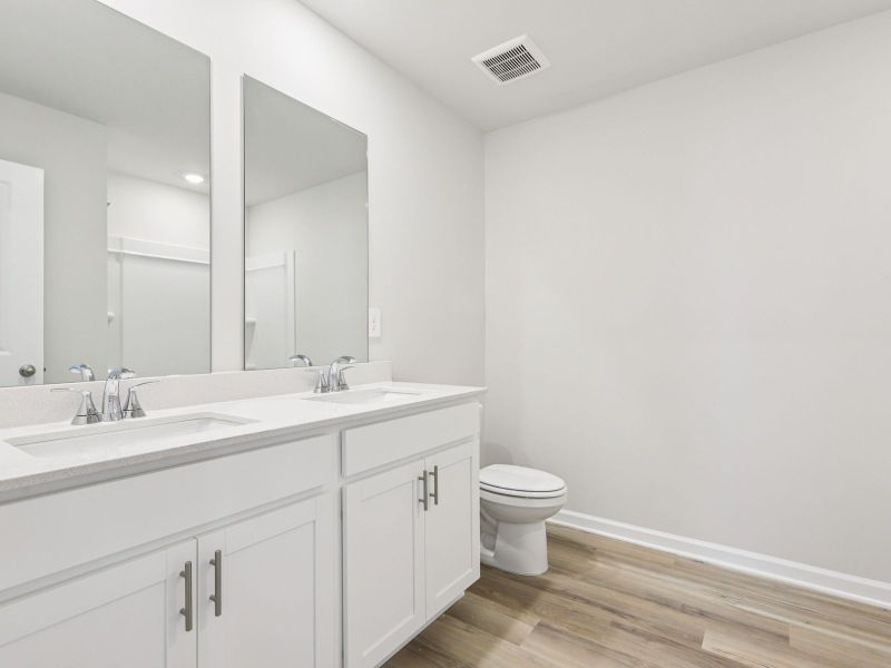 Furnished interior view inside a new home in Moss Farms, Lula (Image 12).