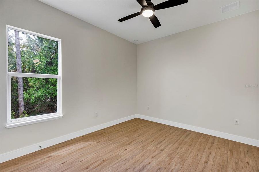 Spacious, unfurnished interior of a new home in , Port Charlotte (Image 33).