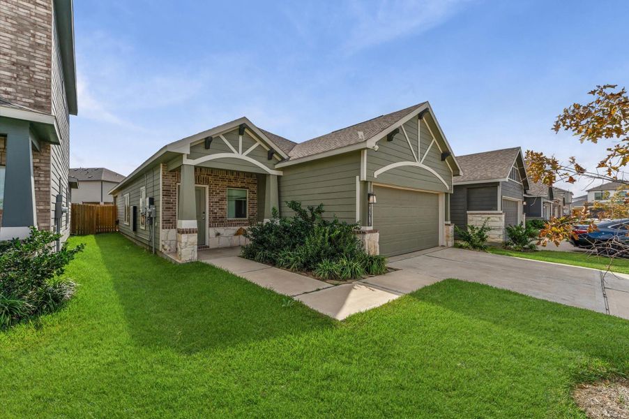 Exterior details and patio area of a home in Cypress Oaks North, Cypress (Image 3).