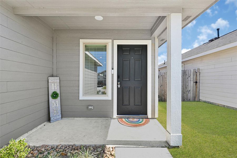 Exterior details and patio area of a home in Townsend Reserve: Cottage Collection, Splendora (Image 2). Exterior details and patio area of a home in Townsend Reserve: Cottage Collection, Splendora (Image 2).