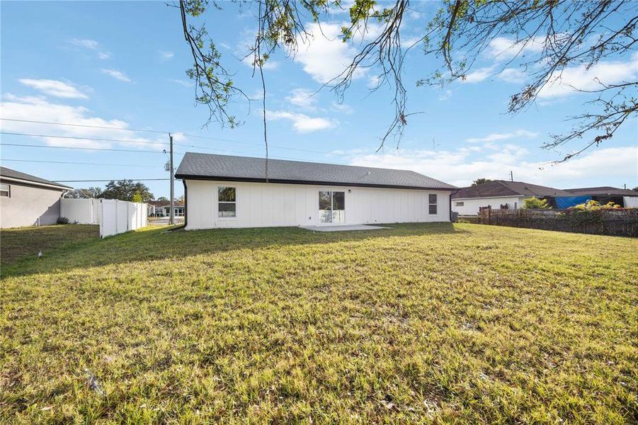 Exterior details and patio area of a home in , North Port (Image 23).