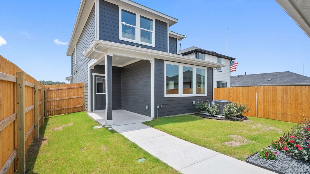 Representative exterior photo of a completed home built from the The Emily by D.R. Horton in Valverde, Bastrop, TX (Image 22). Representative exterior photo of a completed home built from the The Emily by D.R. Horton in Valverde, Bastrop, TX (Image 22).