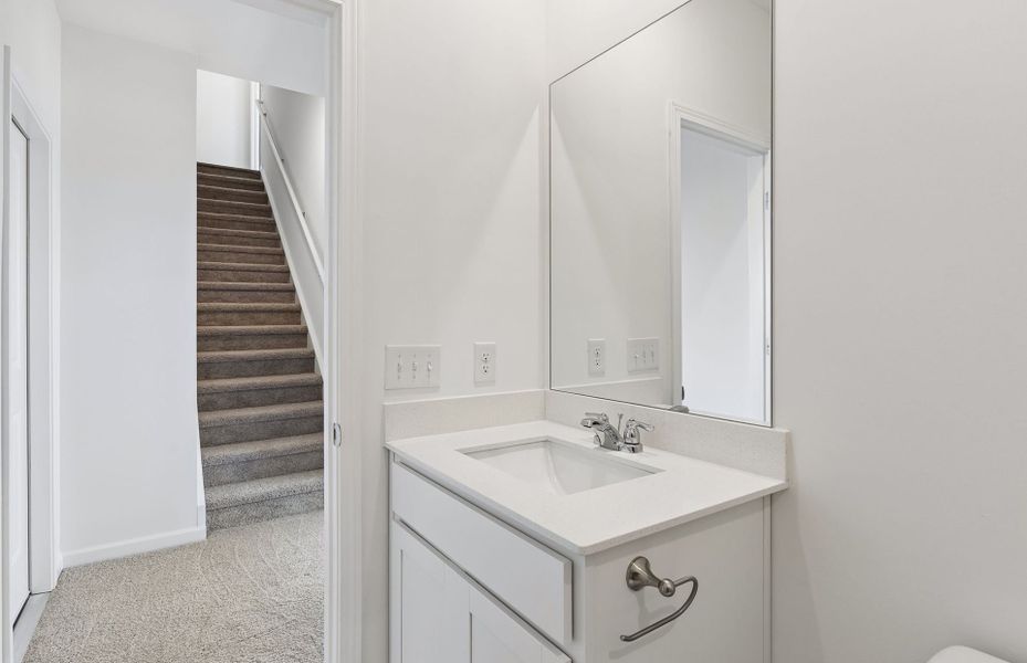 Furnished interior view inside a new home in Highlands of Carter's Station, Columbia (Image 5). Furnished interior view inside a new home in Highlands of Carter's Station, Columbia (Image 5).