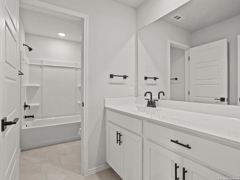 Furnished interior view inside a new home in Hannah Heights, Seguin (Image 32).