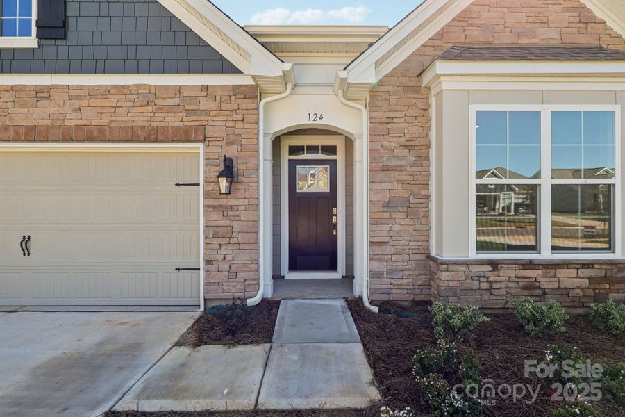 Exterior details and patio area of a home in Brookside, Troutman (Image 24).