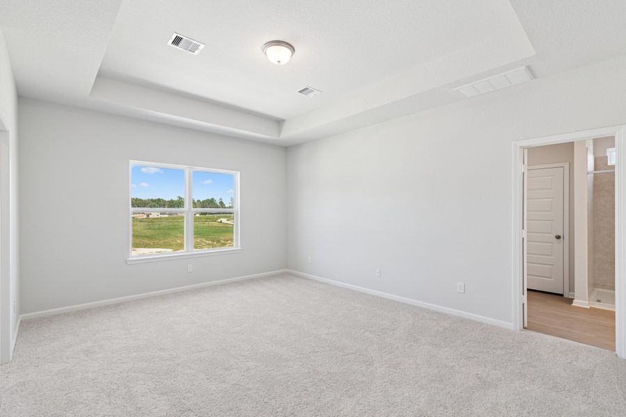 The Oriole II- Primary Bedroom with Tray Ceiling. Sample image to be used for example only, colors, options and upgrades vary.