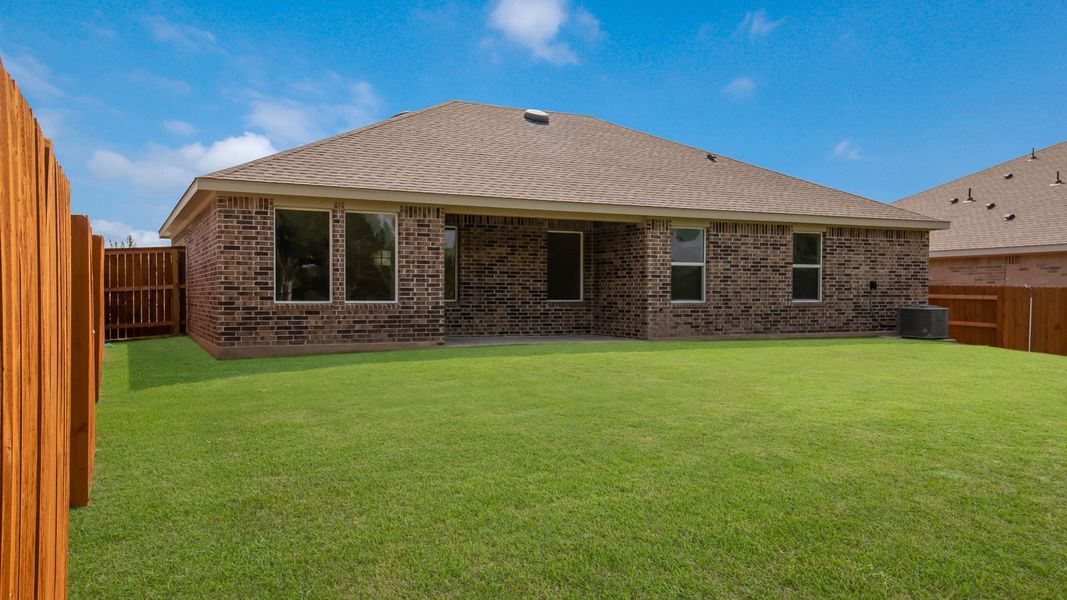 Representative exterior photo of a completed home built from the The Alvin by D.R. Horton in Riverview, Georgetown, TX (Image 14).