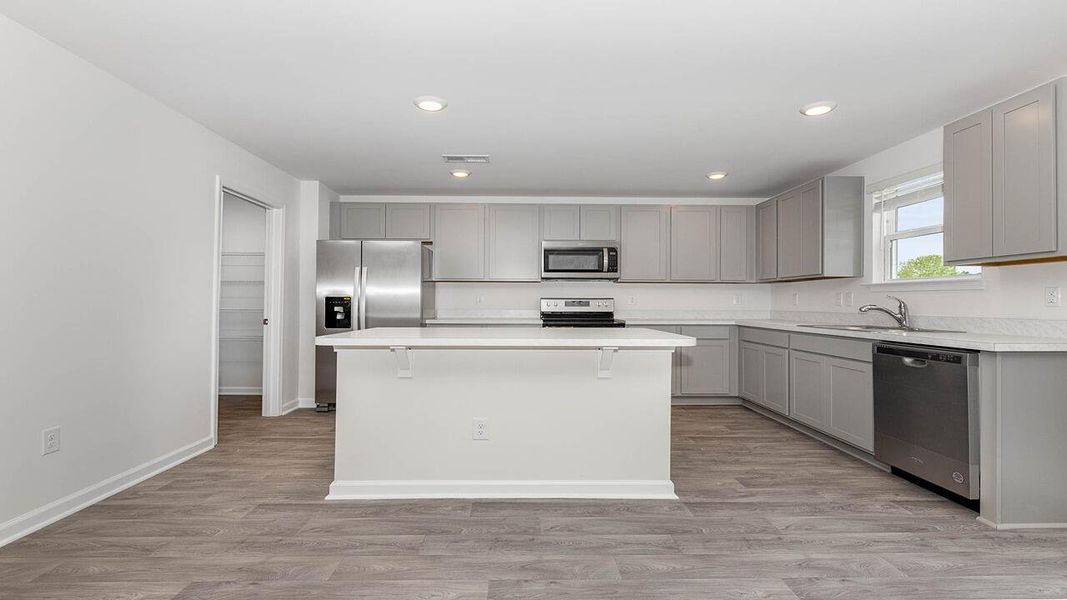 Furnished interior view inside a new home in The Ranch, Holly Hill (Image 3).