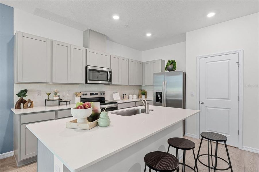 Furnished interior view inside a new home in Nona West, Orlando (Image 4).