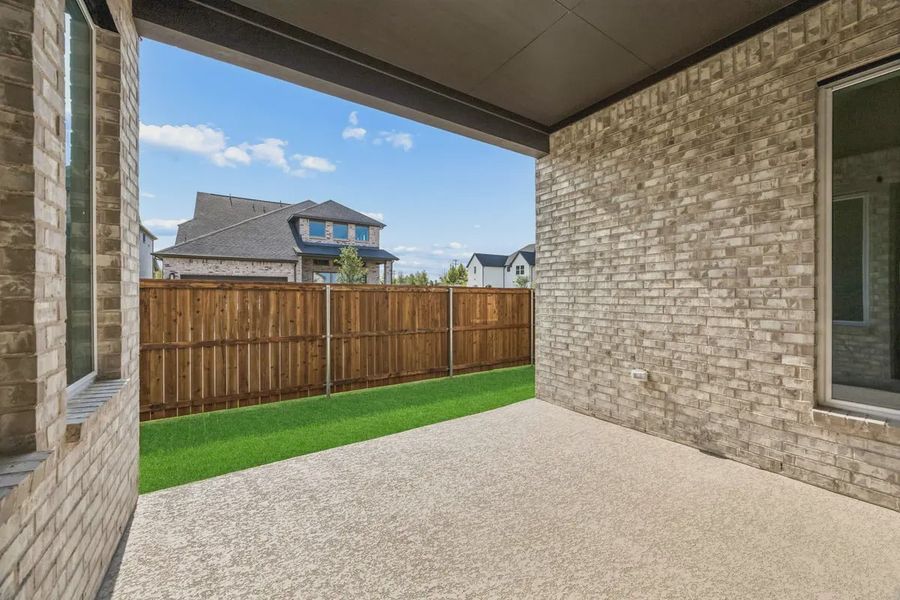 Exterior details and patio area of a home in The Grove Frisco, Frisco (Image 3).