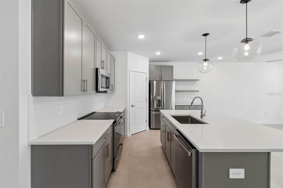 Furnished interior view inside a new home in Aspire at Canter Creek, Davenport (Image 6).
