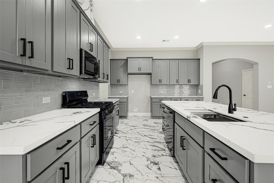 Every cook's favorite...a gas range. SS appliances includes. Beautiful cabinets with accented tile back splash. Every cook's favorite...a gas range. SS appliances includes. Beautiful cabinets with accented tile back splash.