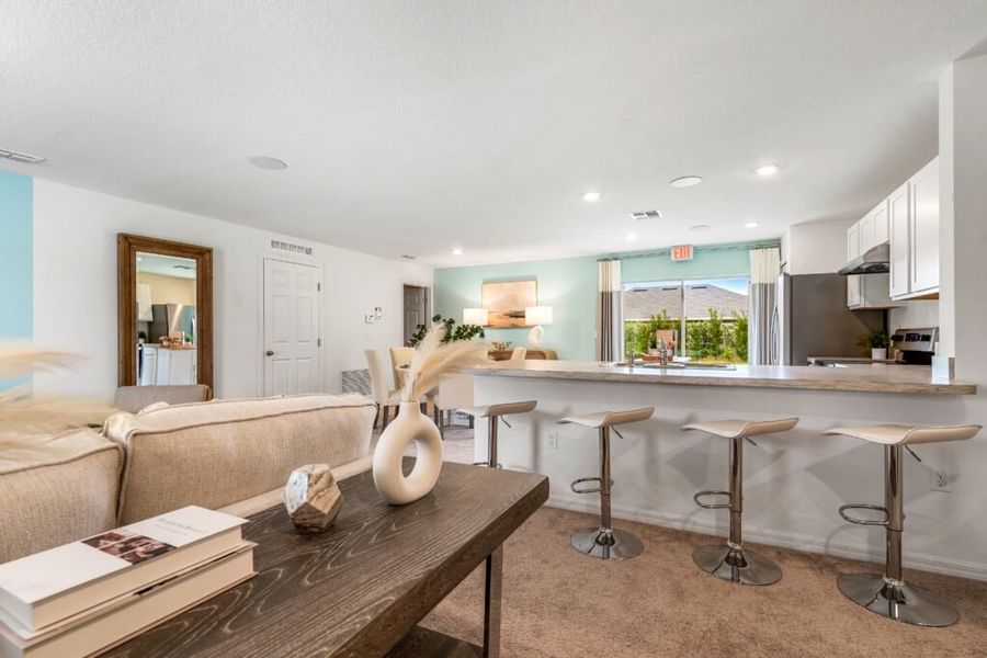 Representative furnished interior of a home built from the Bamboo by Holiday Builders in Port St Lucie, Port St. Lucie (Image 7).