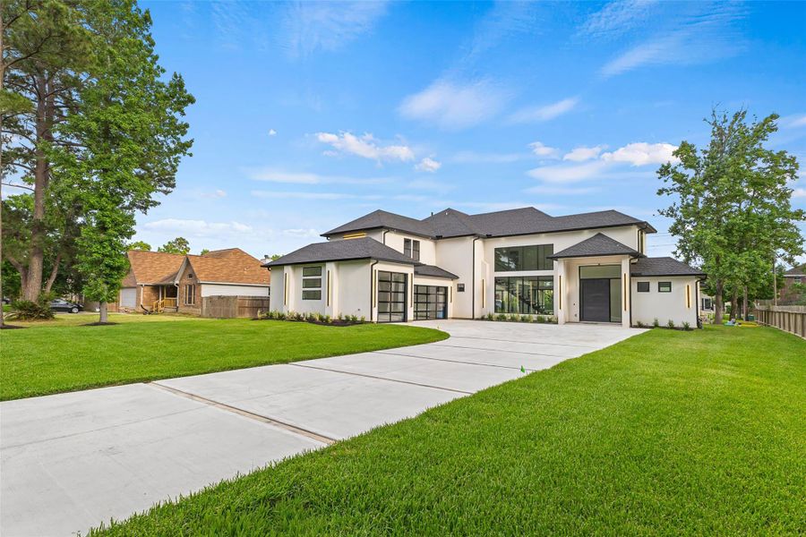 Front exterior of a new home in , Magnolia, TX, highlighting curb appeal (Image 1). Front exterior of a new home in , Magnolia, TX, highlighting curb appeal (Image 1).