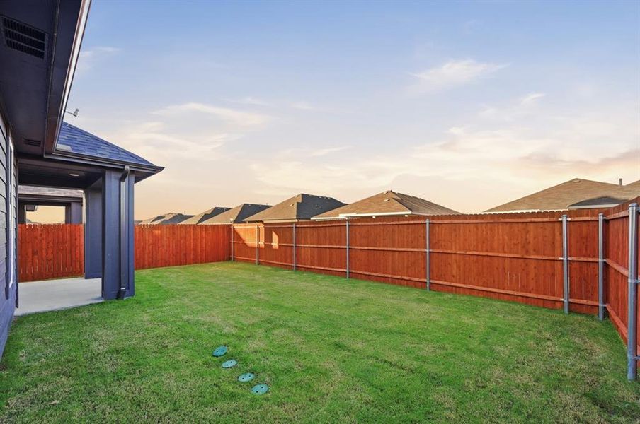 Exterior details and patio area of a home in Heartland, Heartland (Image 3). Exterior details and patio area of a home in Heartland, Heartland (Image 3).