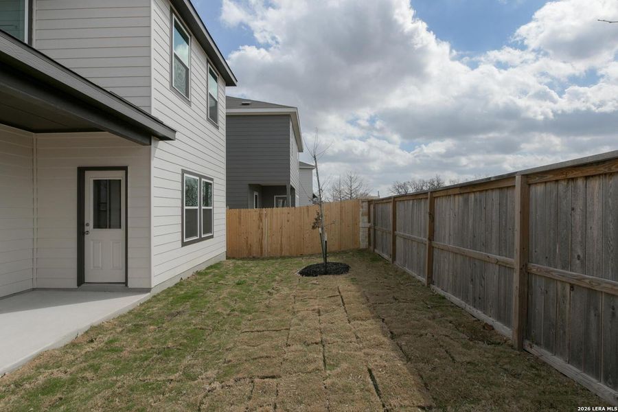 Exterior details and patio area of a home in Hennersby Hollow, San Antonio (Image 2). Exterior details and patio area of a home in Hennersby Hollow, San Antonio (Image 2).