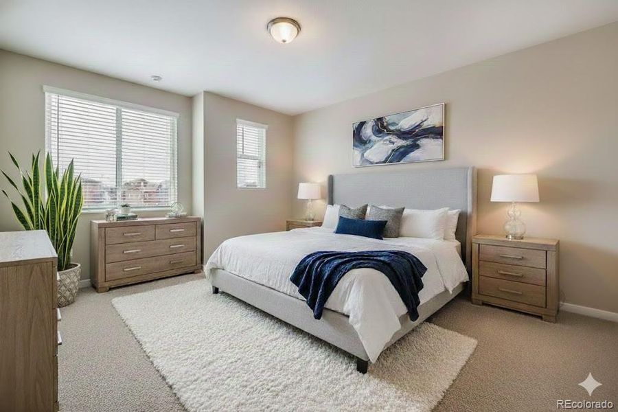 Staged primary bedroom from actual home