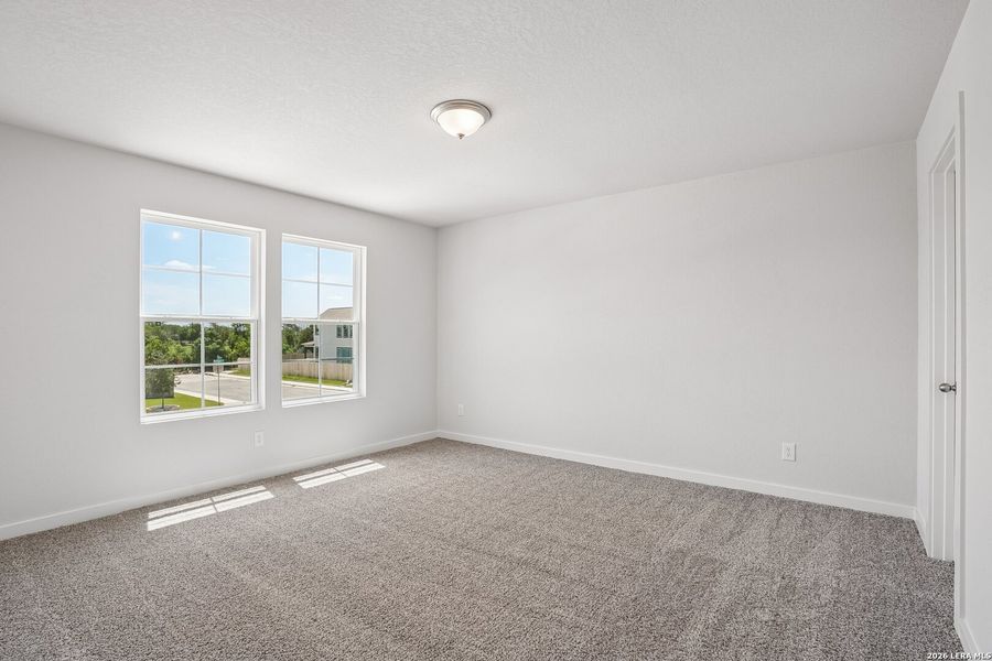 Spacious, unfurnished interior of a new home in August Fields, New Braunfels (Image 24).