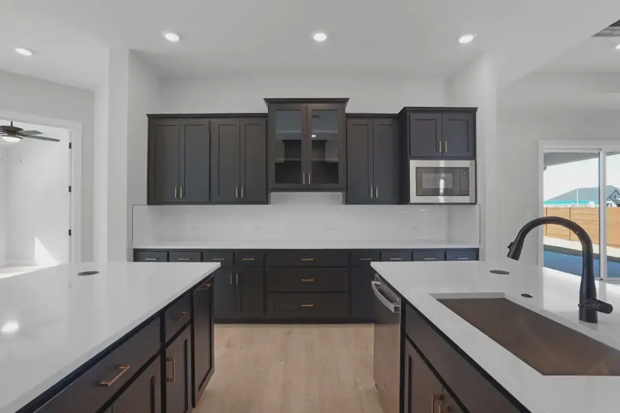 Representative furnished interior of a home built from the Samantha by Chesmar Homes in Lariat, Liberty Hill (Image 4).