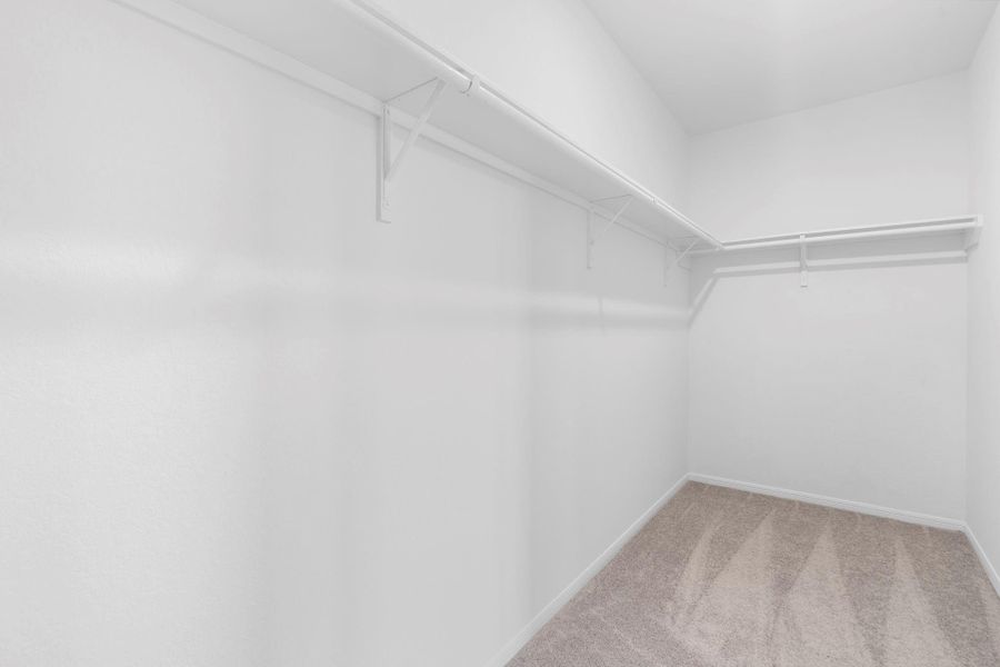 A view of your large primary walk-in Closet A view of your large primary walk-in Closet