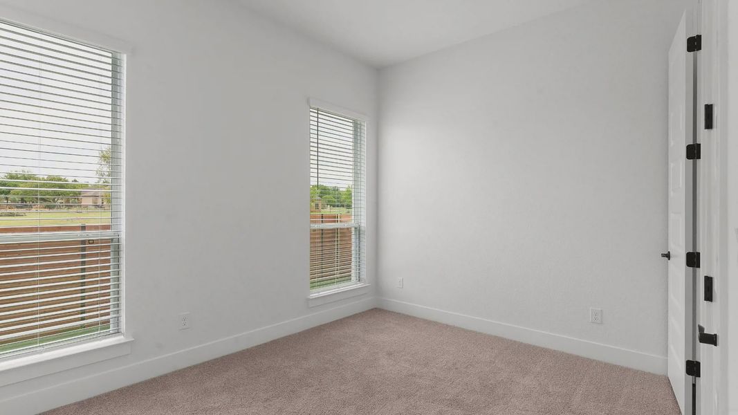 Spacious, unfurnished interior of a new home in The Grove at Blackhawk, Pflugerville (Image 20).