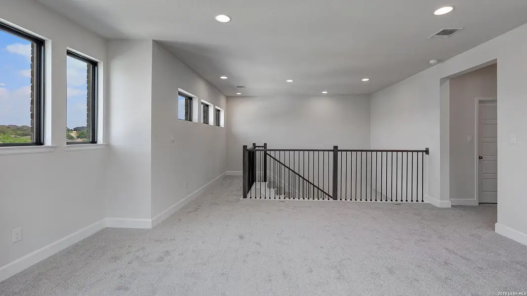 Spacious, unfurnished interior of a new home in Ladera, San Antonio (Image 21). Spacious, unfurnished interior of a new home in Ladera, San Antonio (Image 21).