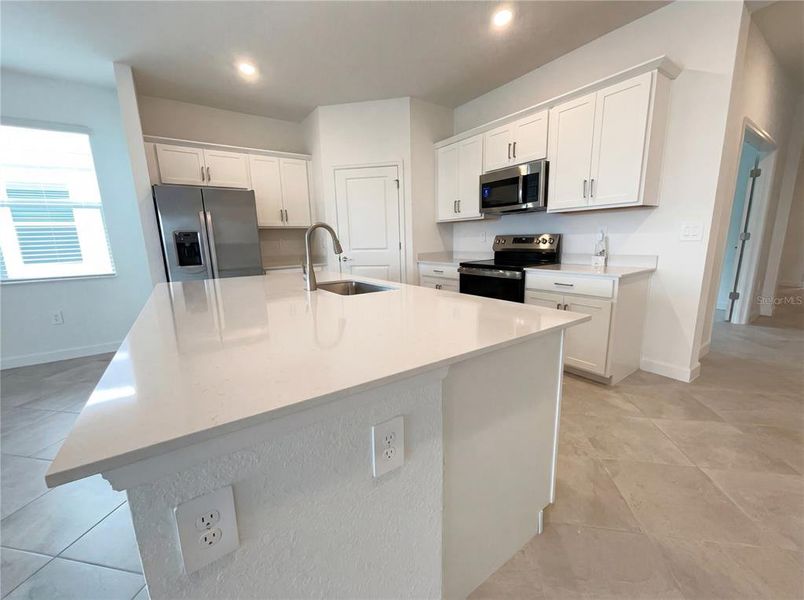 Furnished interior view inside a new home in Harbor East, Port Charlotte (Image 6).