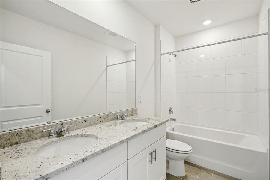 Furnished interior view inside a new home in Benton Hills - Classic Series, Brooksville (Image 4). Furnished interior view inside a new home in Benton Hills - Classic Series, Brooksville (Image 4).